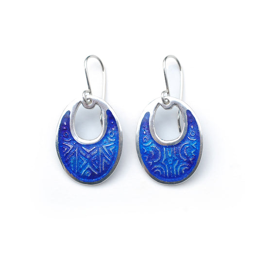 Oval blue and purple etched enamel earrings on a white background.