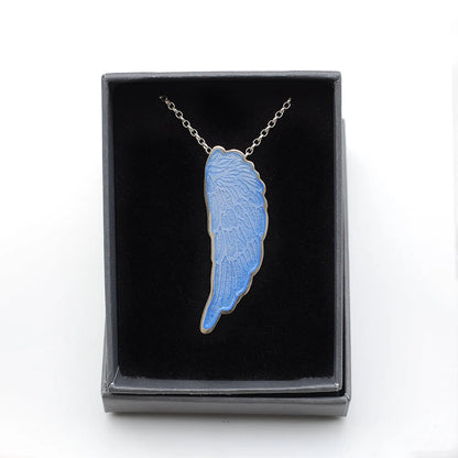 Blue Enamelled Angel Wing Pendant in a gift box, on a white background.