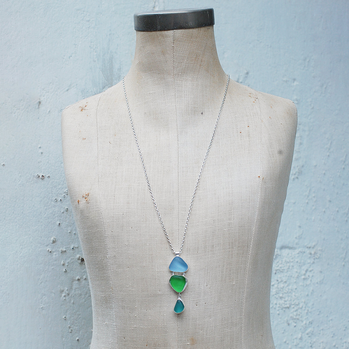 Triple sea glass pendant on a mannequin